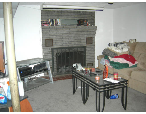 900 Morgan Road West Springfield, MA 01089 - Photo 8 of 10 a living room with furniture and a fireplace
