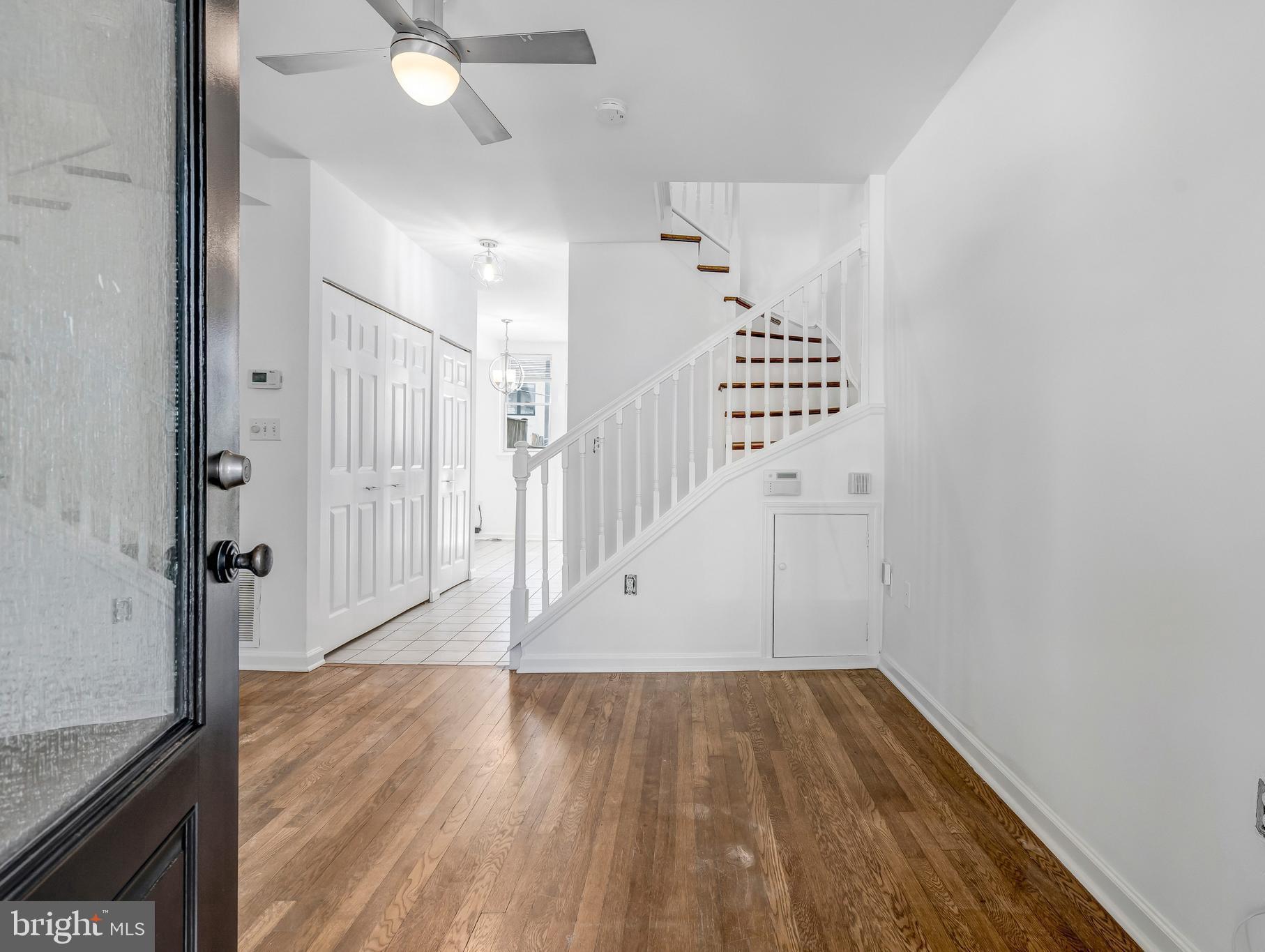 1749 L Street Northeast Washington, DC 20002 - Photo 4 of 24 wooden floor in an empty room with a window