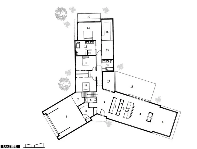 a view of a lake with houses in the back