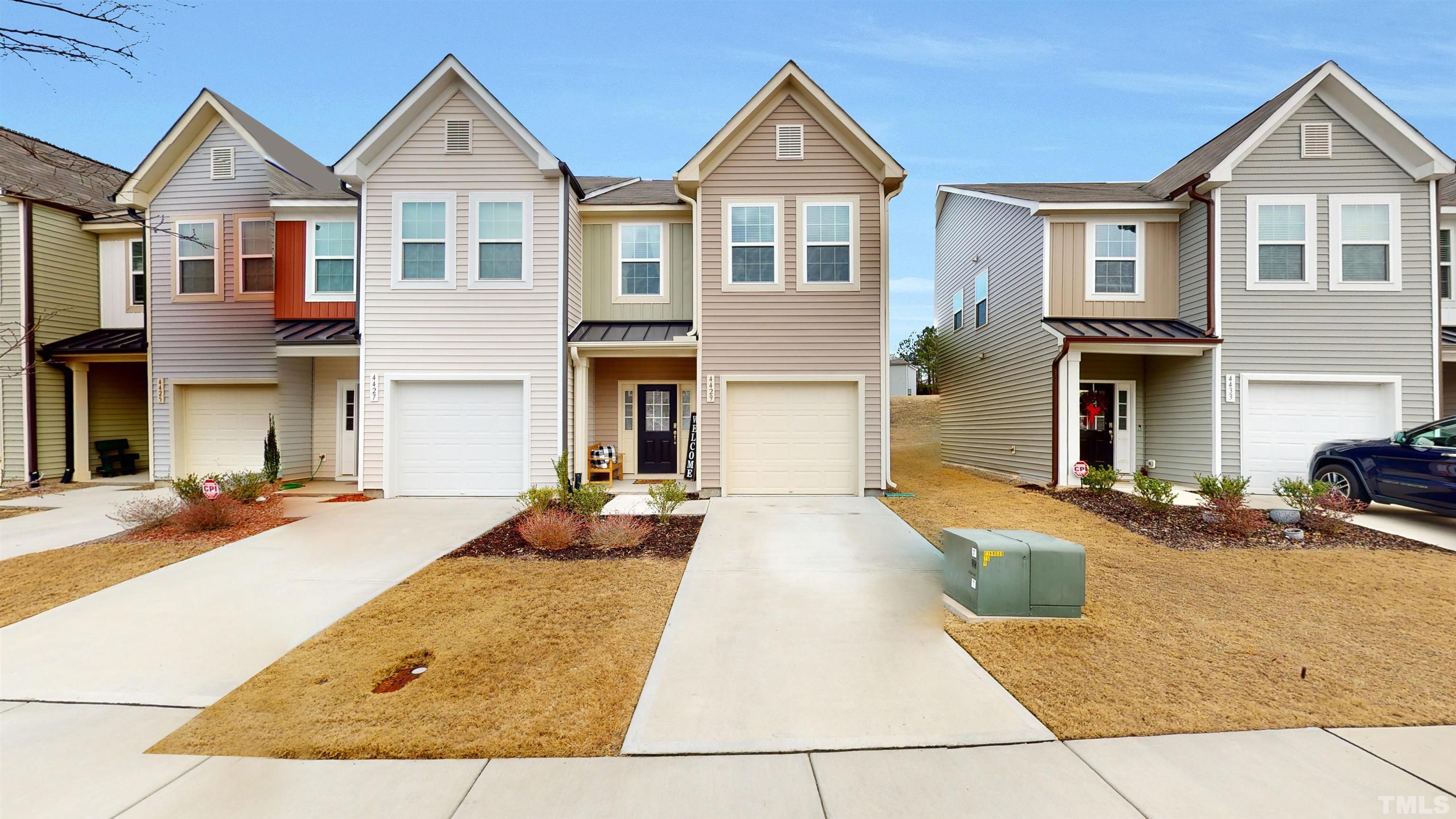 a front view of a house with yard