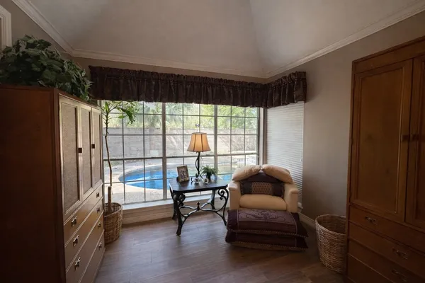a spacious bathroom with double sink and shower