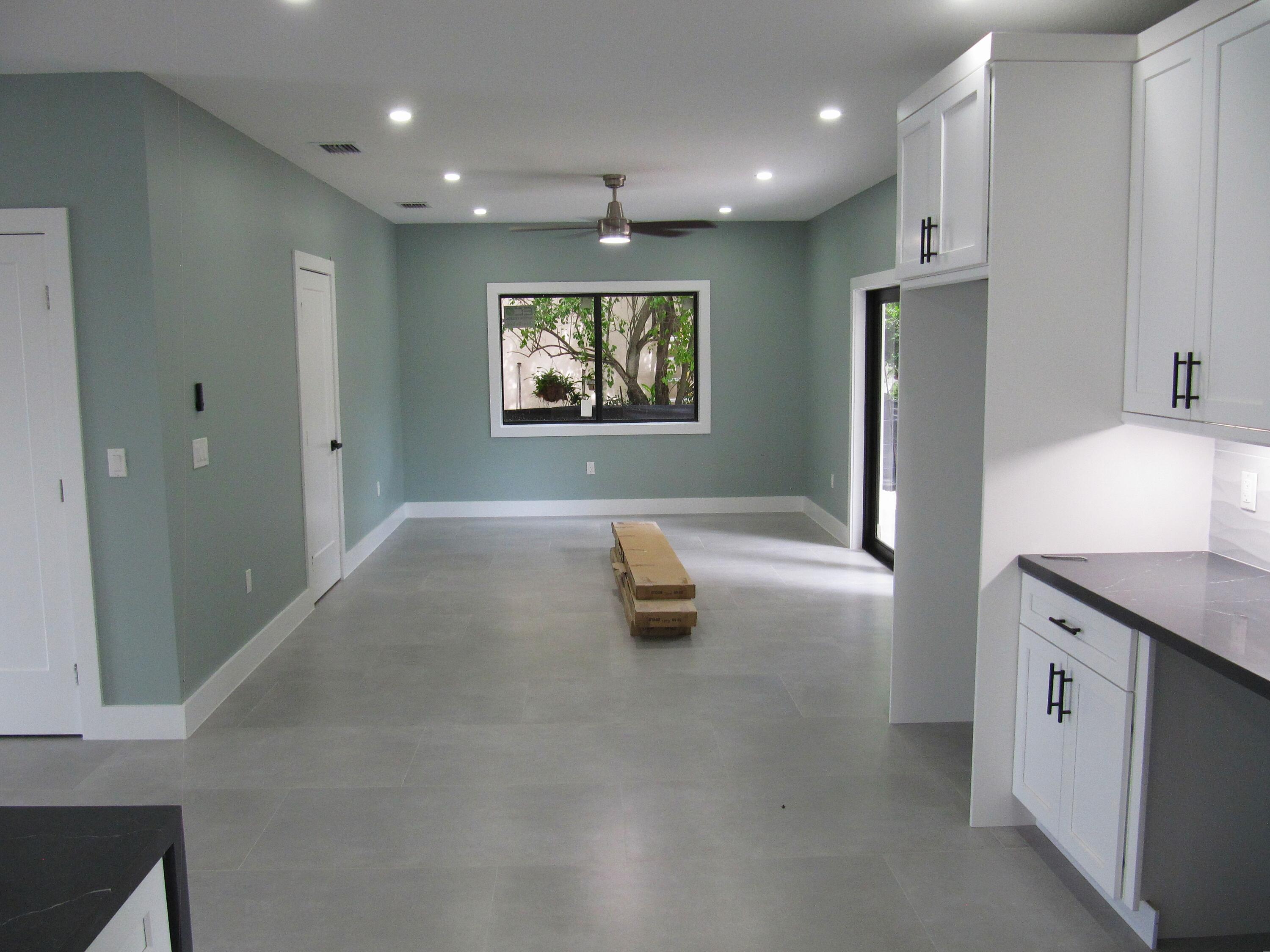 25 Abaco Road Key Largo, FL 33037 - Photo 5 of 17 a kitchen with stainless steel appliances a refrigerator and a sink
