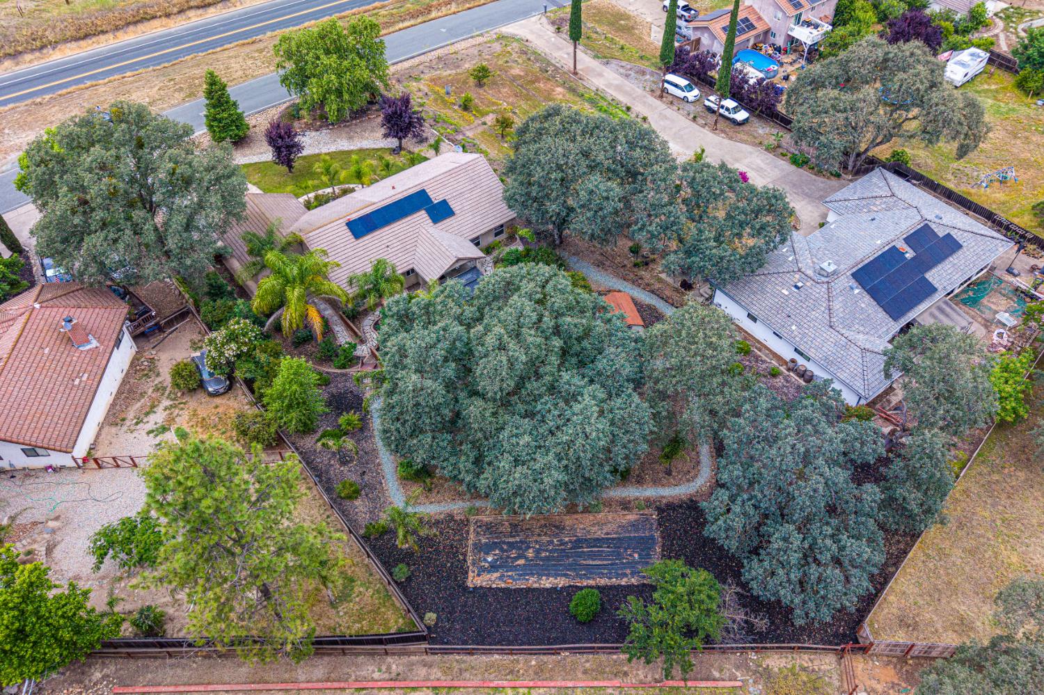 2083 State Rte 26 Valley Springs, CA 95252 - Photo 53 of 59 an aerial view of a house with a yard and garden