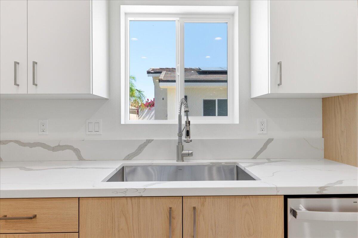 68160 Modalo Road Cathedral City, CA 92234 - Photo 13 of 57 a kitchen with a sink and a window