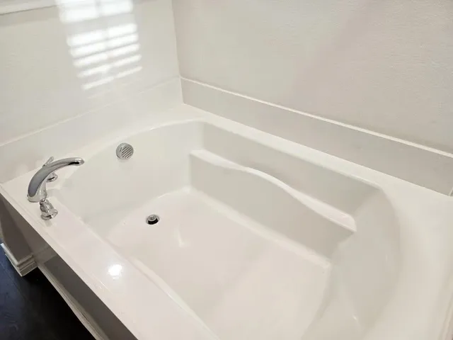 a bathroom with a bathtub