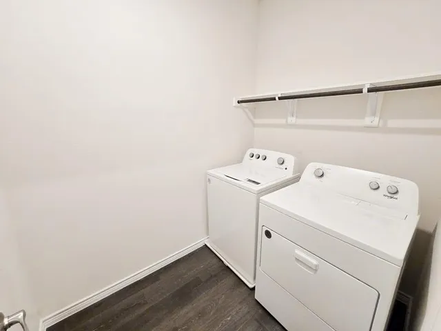 a utility room with dryer and washer