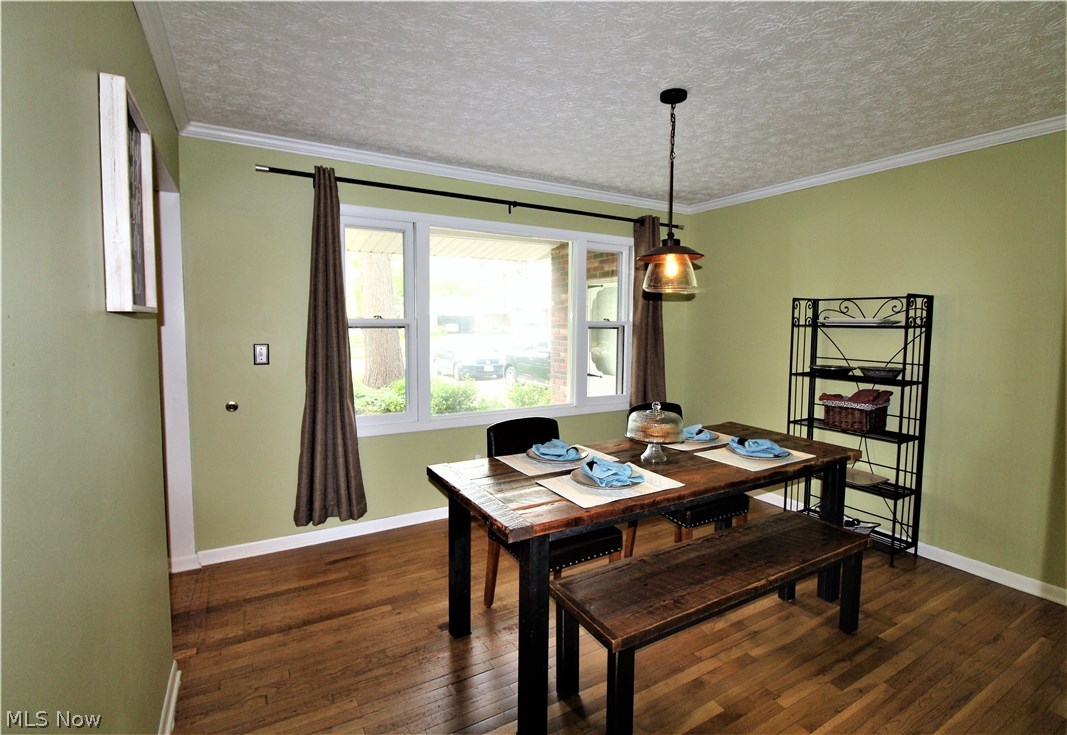 2887 Lee Road Silver Lake, OH 44224 - Photo 5 of 24 Formal Dining Room with Hardwood Floor and Crown Molding