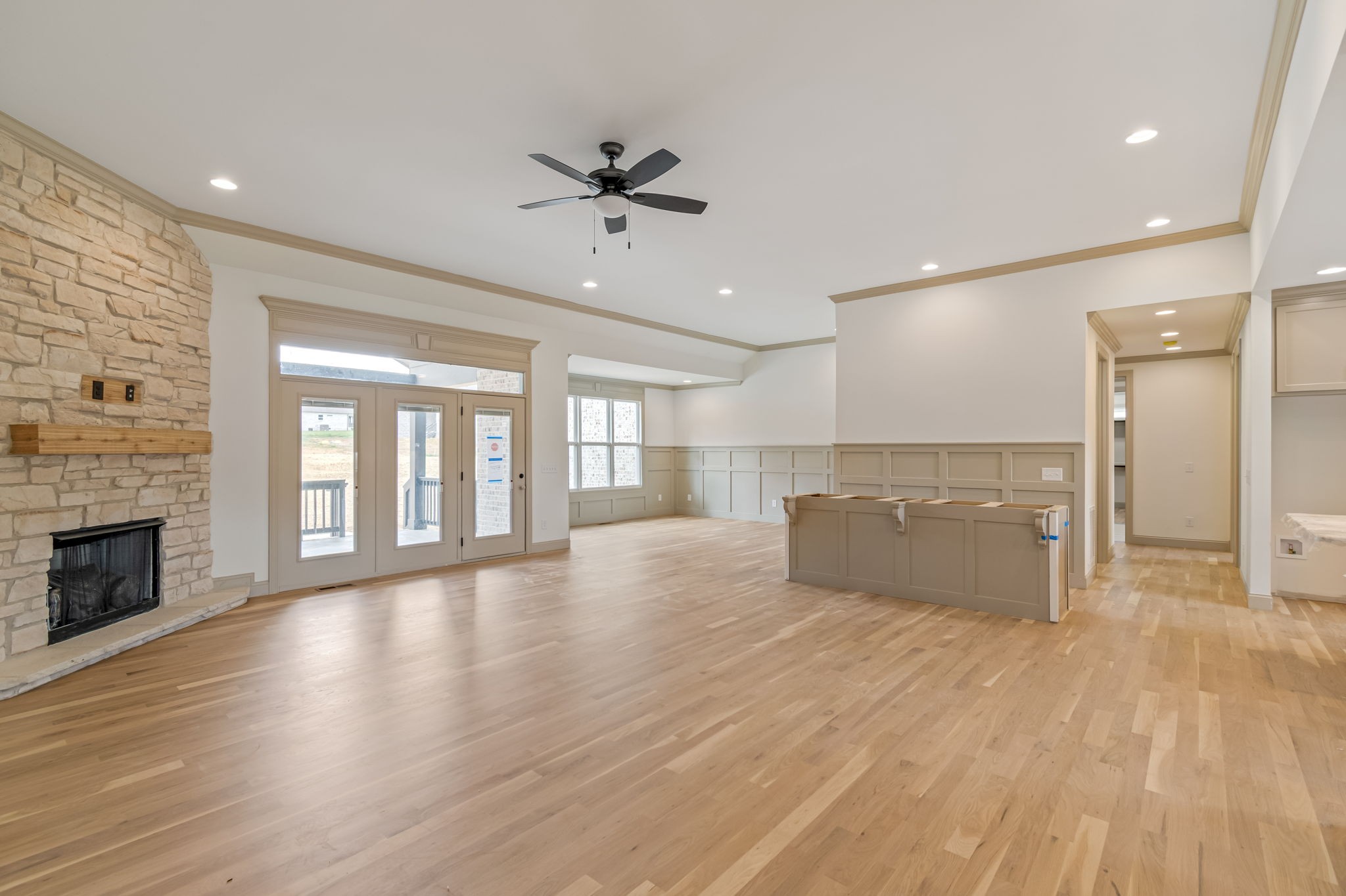 4049 Advocate Path Culleoka, TN 38451 - Photo 11 of 25 a view of empty room with wooden floor and fireplace