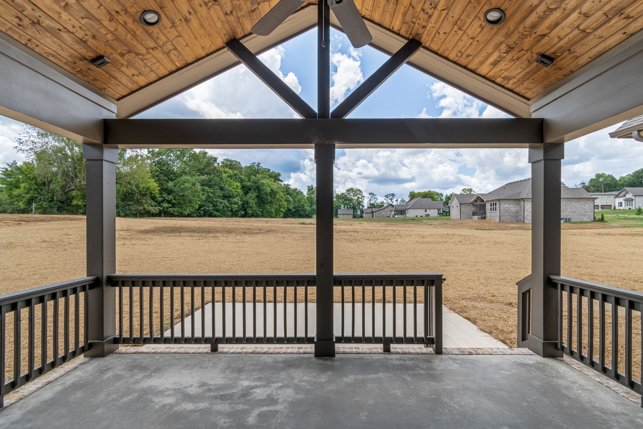 4049 Advocate Path Culleoka, TN 38451 - Photo 12 of 25 a view of a porch with a floor to ceiling window