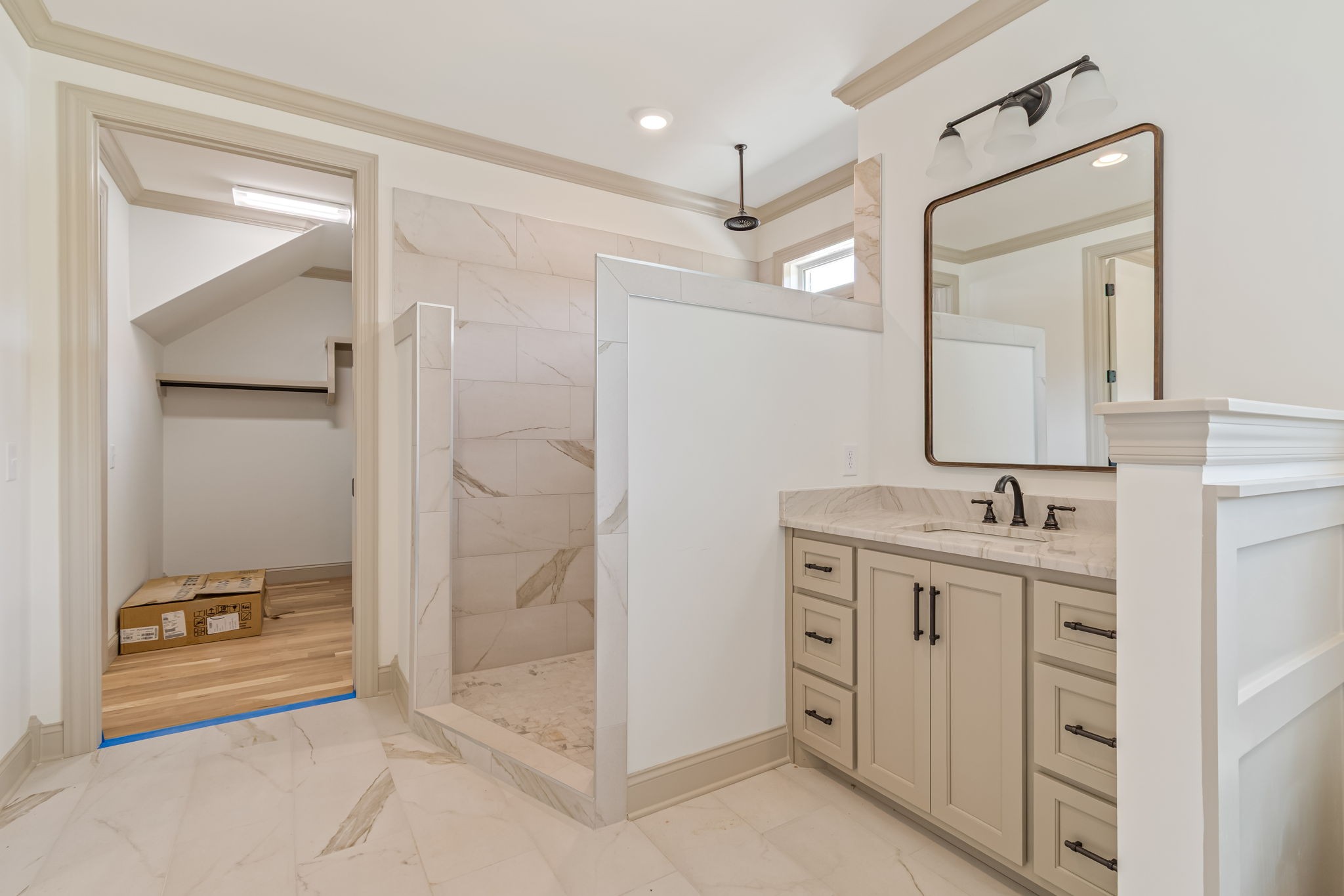4049 Advocate Path Culleoka, TN 38451 - Photo 14 of 25 a bathroom with a double vanity sink mirror and shower