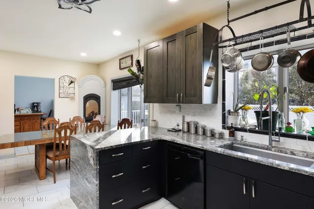 a bathroom with a sink a vanity and a mirror