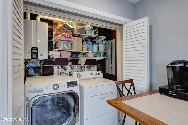a view of a house with backyard and porch