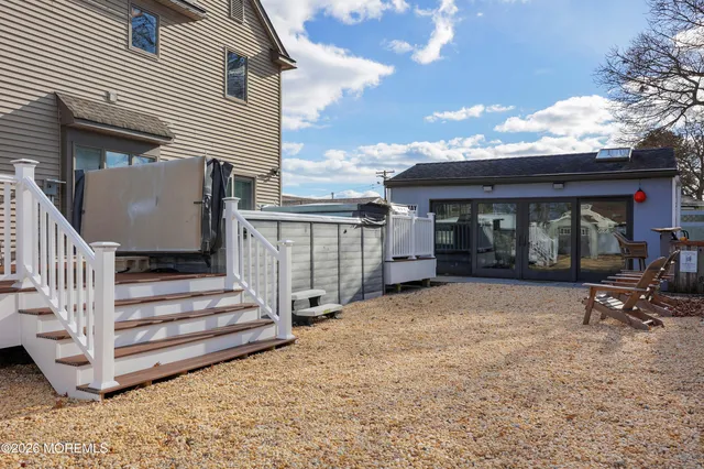 an aerial view of a house with swimming pool