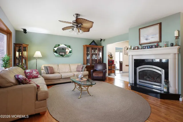 a large kitchen with a table and chairs