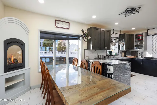 a kitchen with a sink a counter space and cabinets