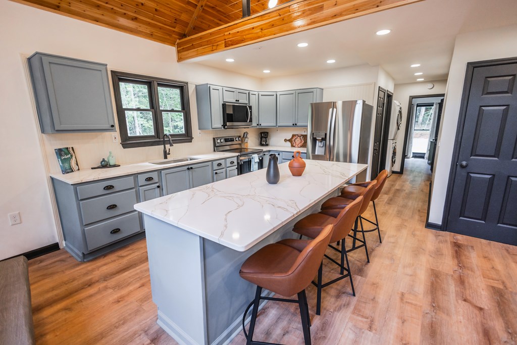 2 Watson Gap Road Mineral Bluff, GA 30559 - Photo 21 of 80 a view of a dining room with furniture and a kitchen
