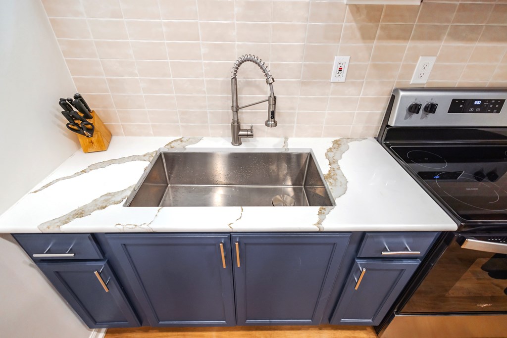 2 Watson Gap Road Mineral Bluff, GA 30559 - Photo 64 of 80 a kitchen with a sink and a stove