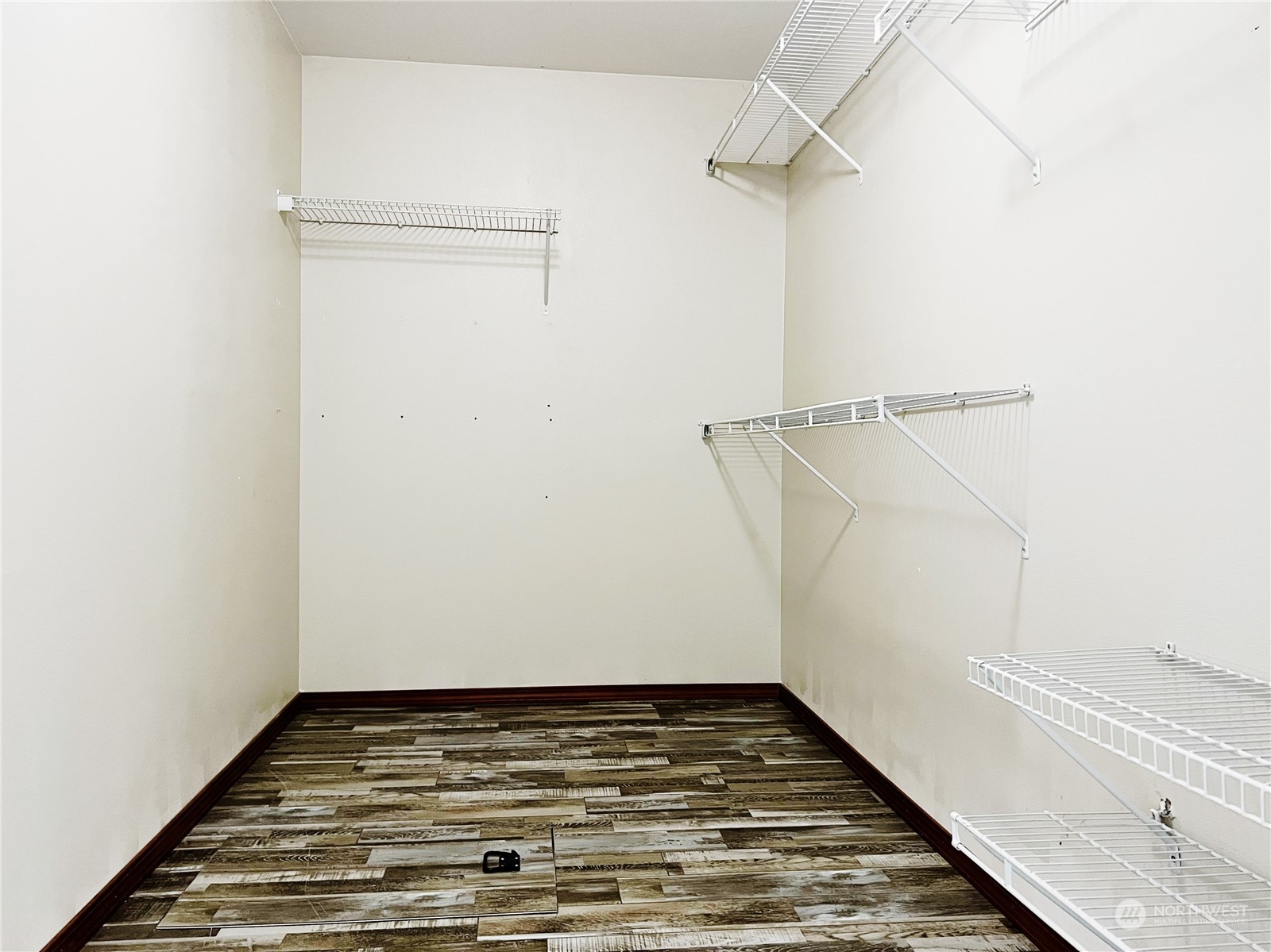 742 East Thornton Road Shelton, WA 98584 - Photo 12 of 39 a view of a room with racks on the wall