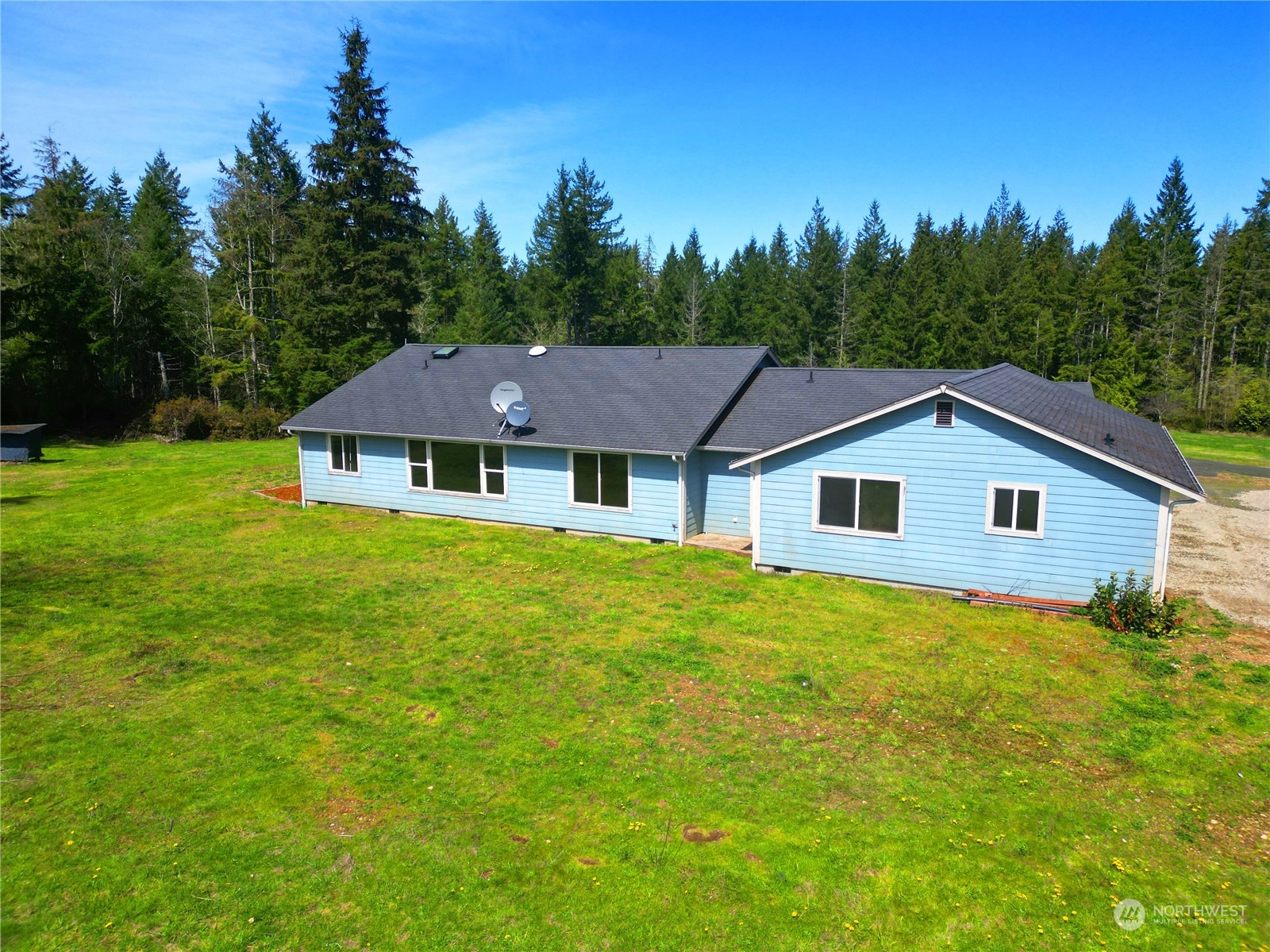 742 East Thornton Road Shelton, WA 98584 - Photo 6 of 39 a aerial view of a house with yard and green space