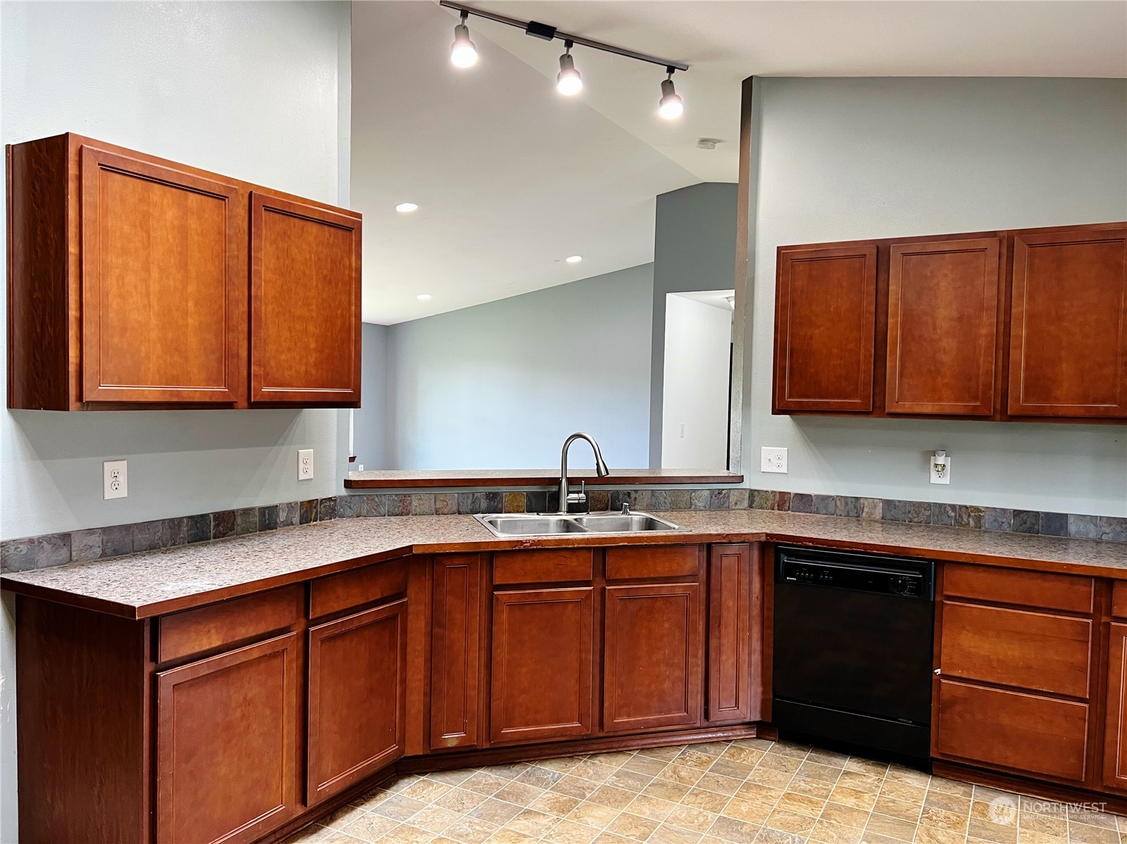 742 East Thornton Road Shelton, WA 98584 - Photo 9 of 39 a kitchen with a sink and cabinets