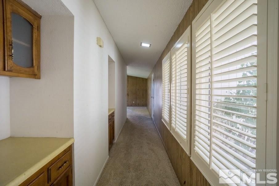 14045 Chamy Drive Reno, NV 89521 - Photo 16 of 25 a view of hallway with a large window