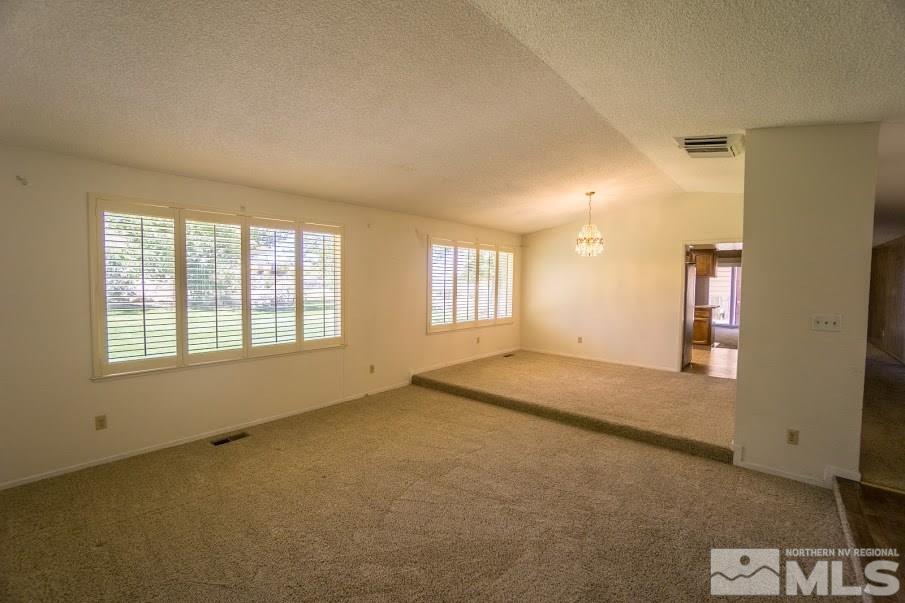 14045 Chamy Drive Reno, NV 89521 - Photo 3 of 25 a view of an empty room with a window