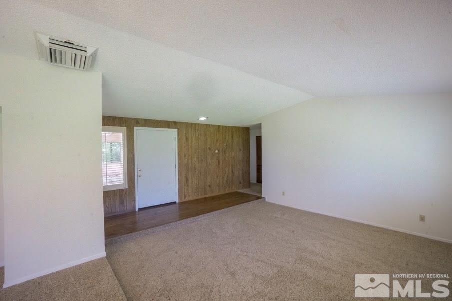 14045 Chamy Drive Reno, NV 89521 - Photo 5 of 25 an empty room with windows