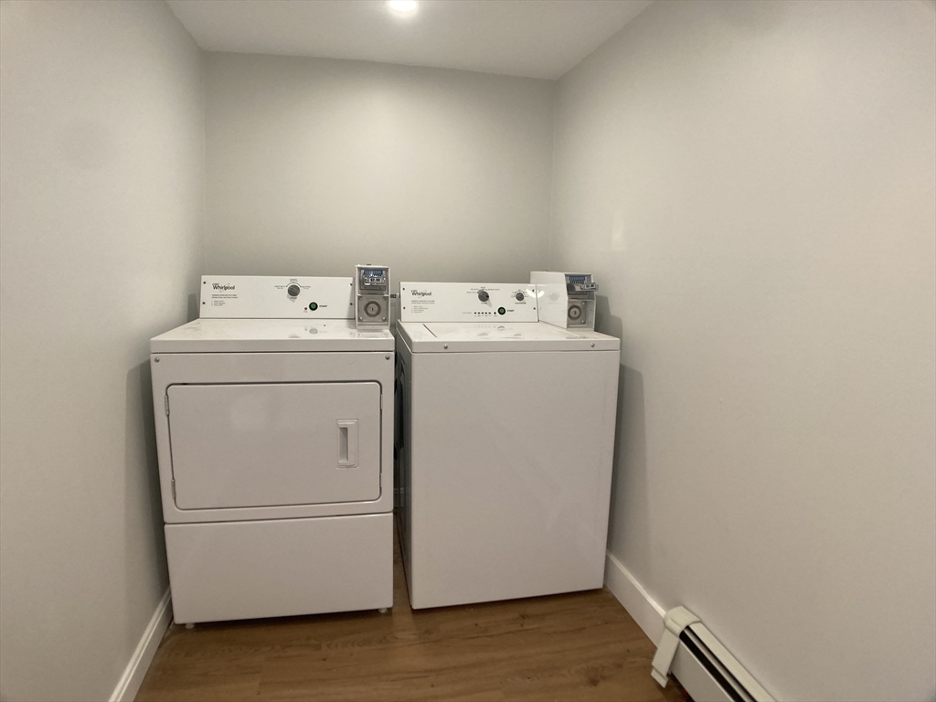 78 West Central Street, Unit 2 Natick, MA 01760 - Photo 12 of 12 a utility room with dryer and washer