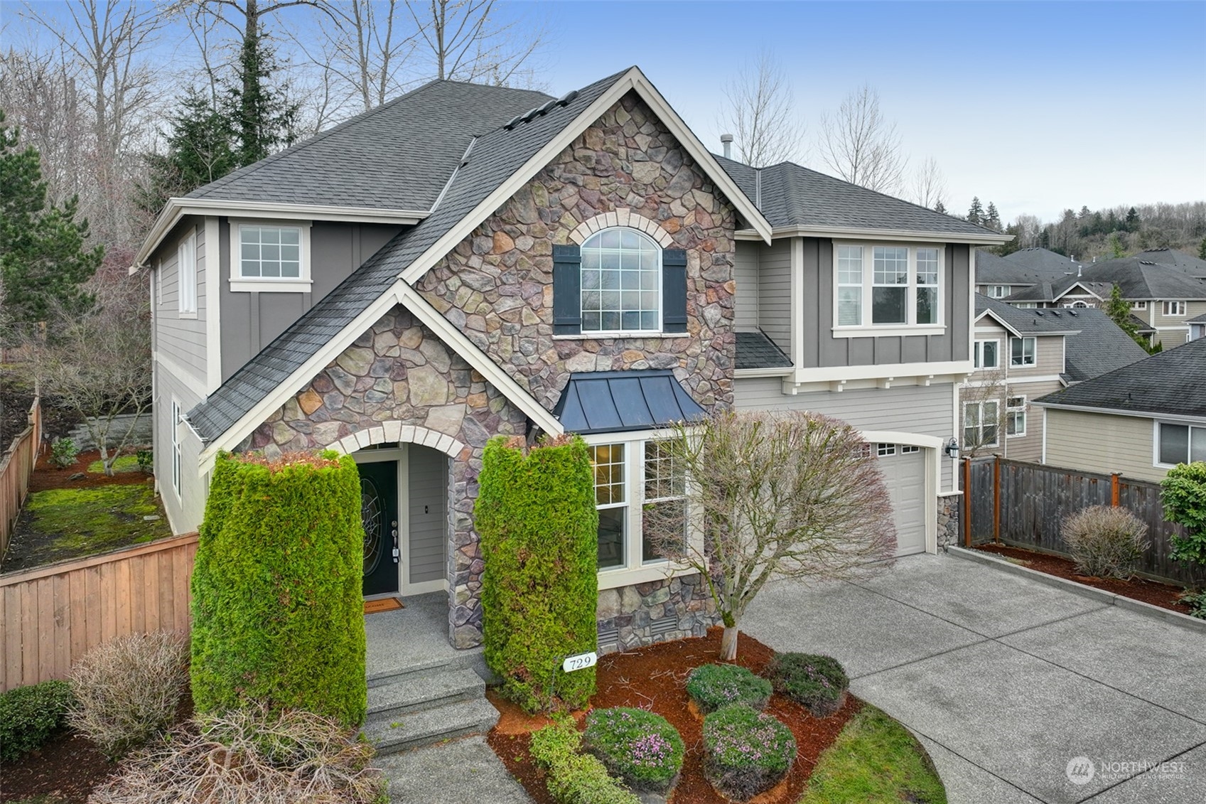 729 South 37th Street Renton, WA 98055 - Photo 36 of 36 a front view of a house with garden