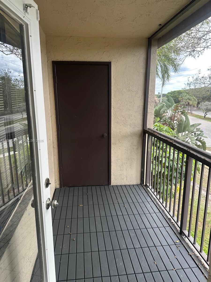 4481 West McNab Road, Unit 37 Pompano Beach, FL 33069 - Photo 7 of 20 a view of a balcony door