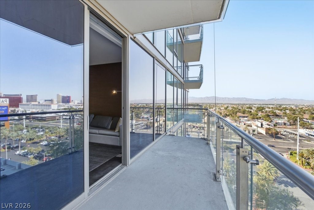 4381 West Flamingo Road, Unit 10306 Las Vegas, NV 89103 - Photo 18 of 26 Enjoy expansive city and mountain views from this contemporary high-rise balcony.