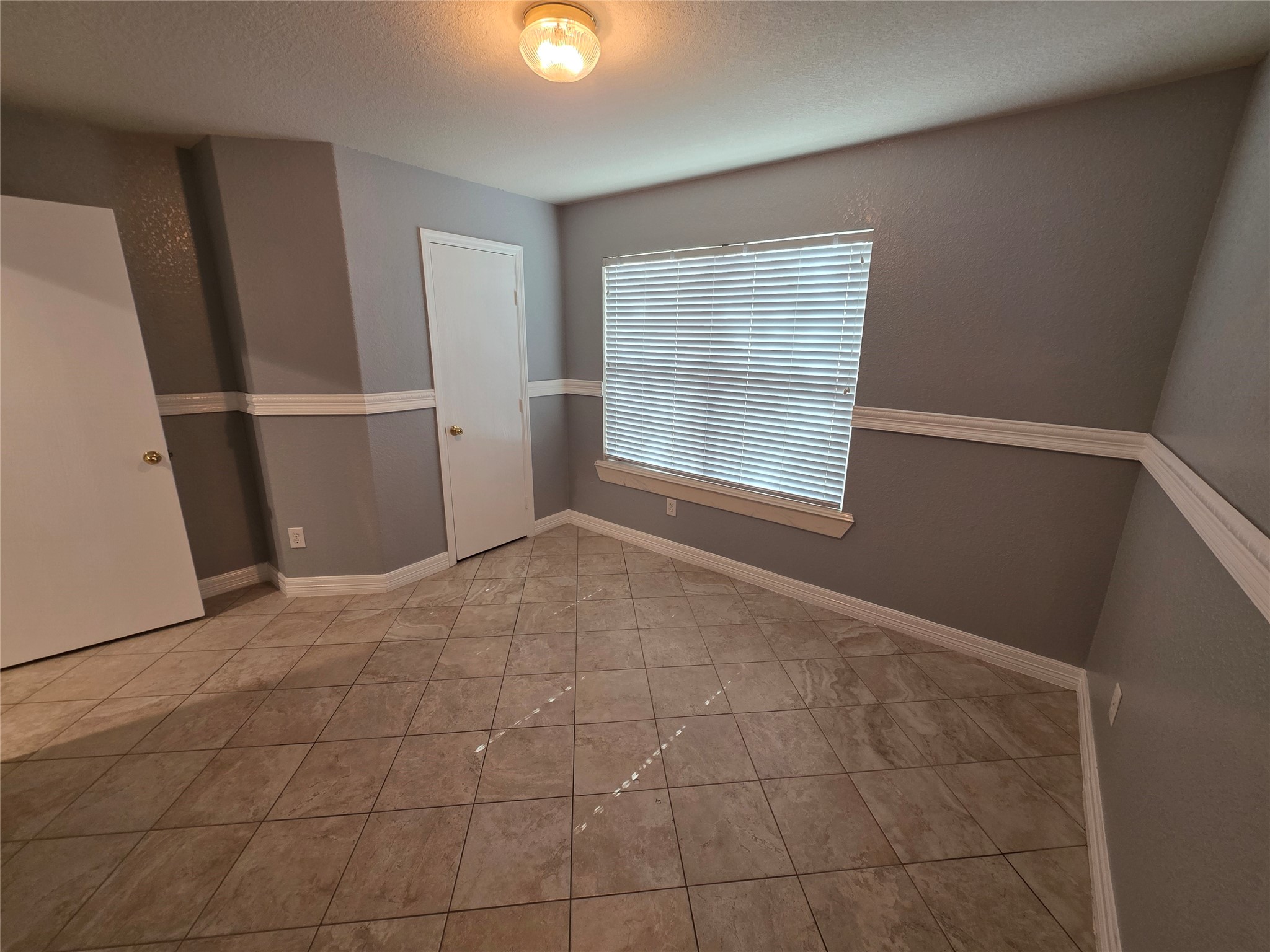 5614 Eagle Landing Houston, TX 77085 - Photo 16 of 28 a view of an empty room with a window