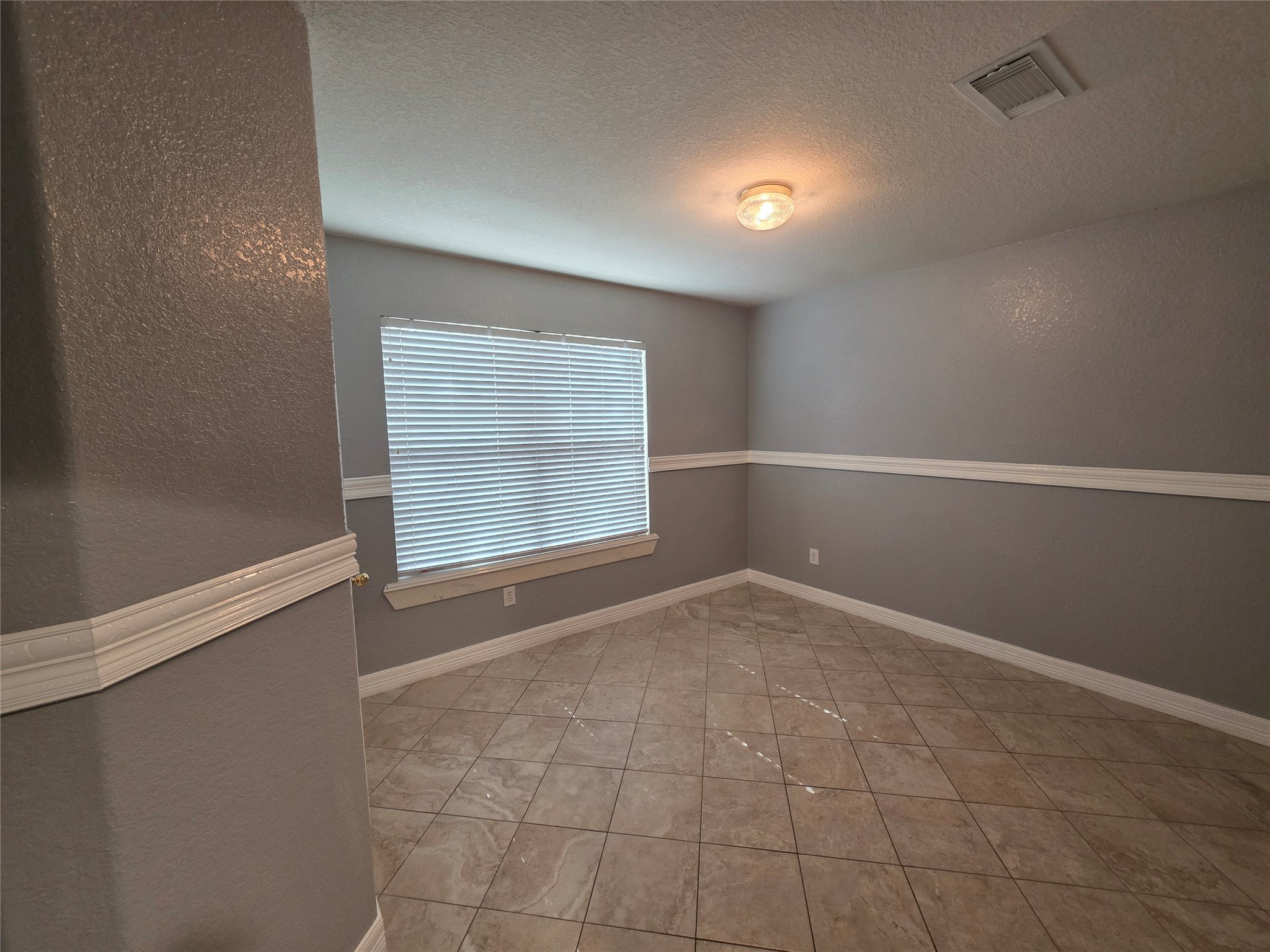 5614 Eagle Landing Houston, TX 77085 - Photo 17 of 28 a view of an empty room with a window