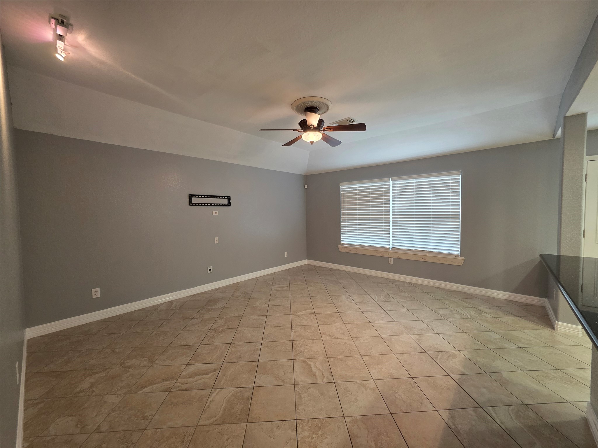 5614 Eagle Landing Houston, TX 77085 - Photo 4 of 28 a view of an empty room with a window