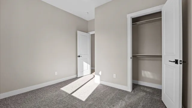 a view of an empty walk in closet