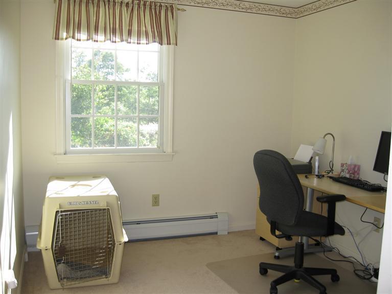 52 Clark Road Brewster, MA 02631 - Photo 18 of 32 a view of a workspace with furniture and a window