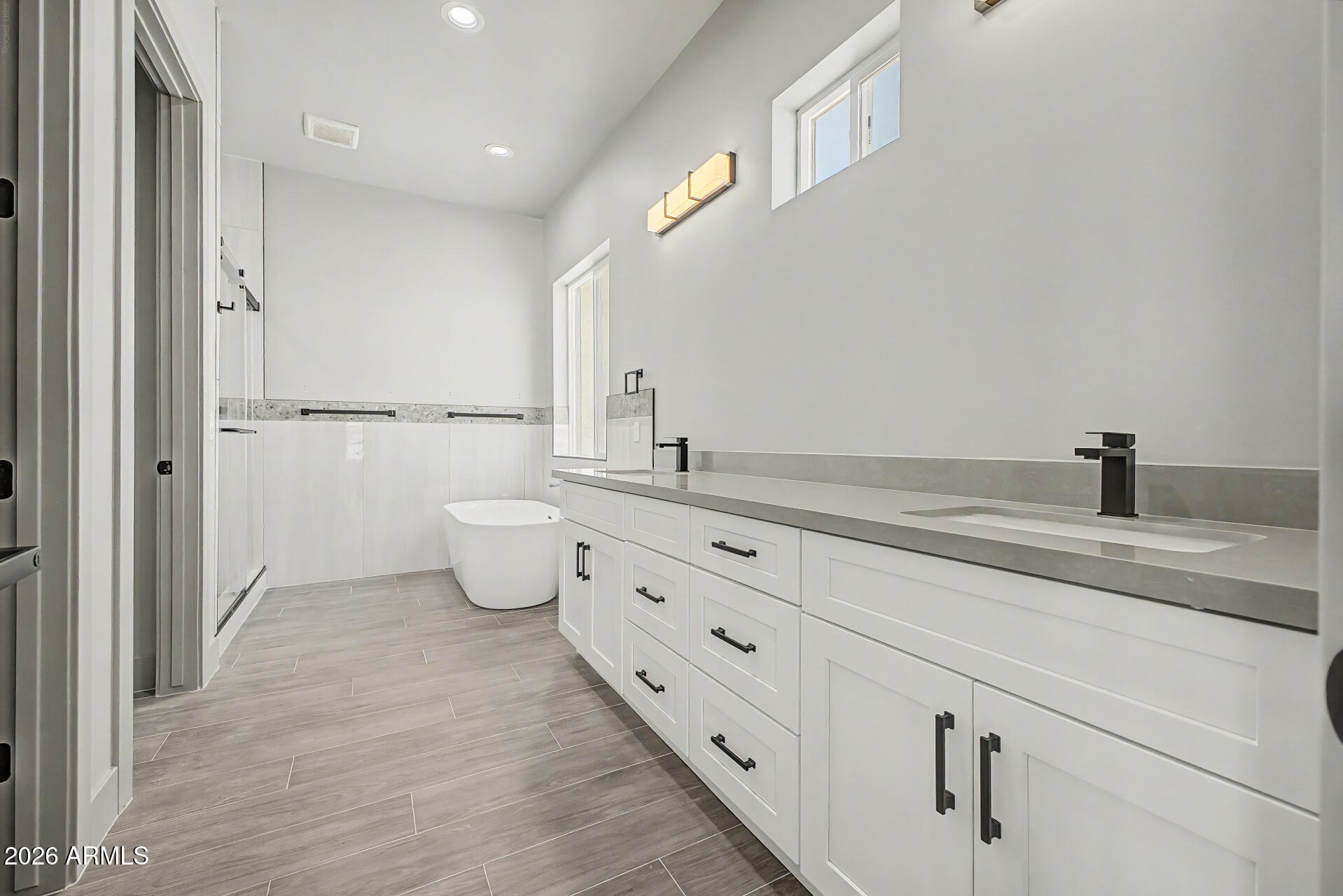 40461 West Robles Road Stanfield, AZ 85172 - Photo 36 of 54 a bathroom with a toilet sink and mirror