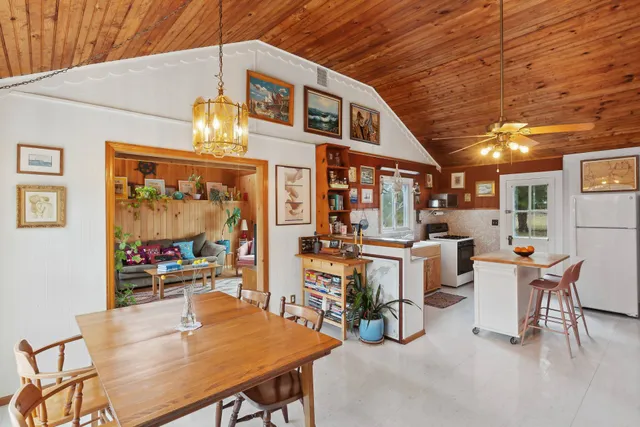 a view of a dining room with furniture