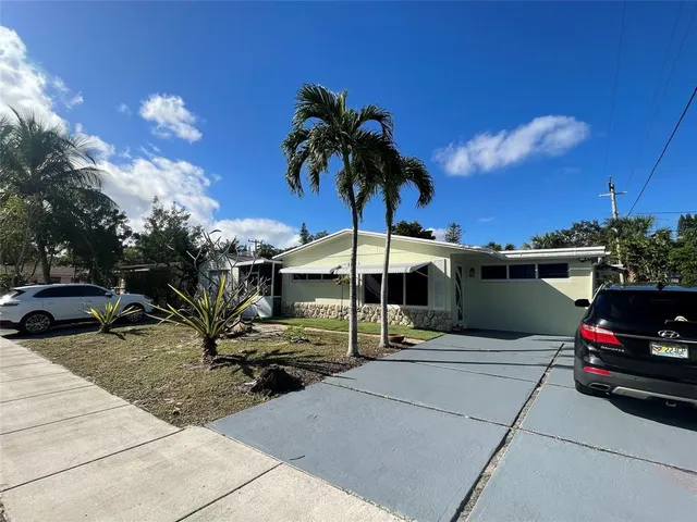 a childrens park with lots of swings and slides
