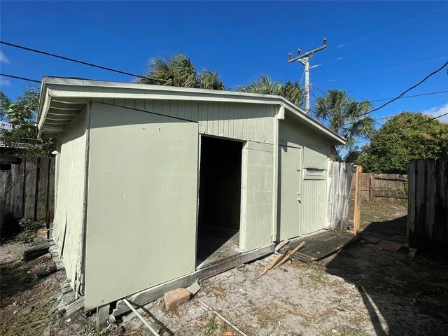 a view of a utility room with storage and utility