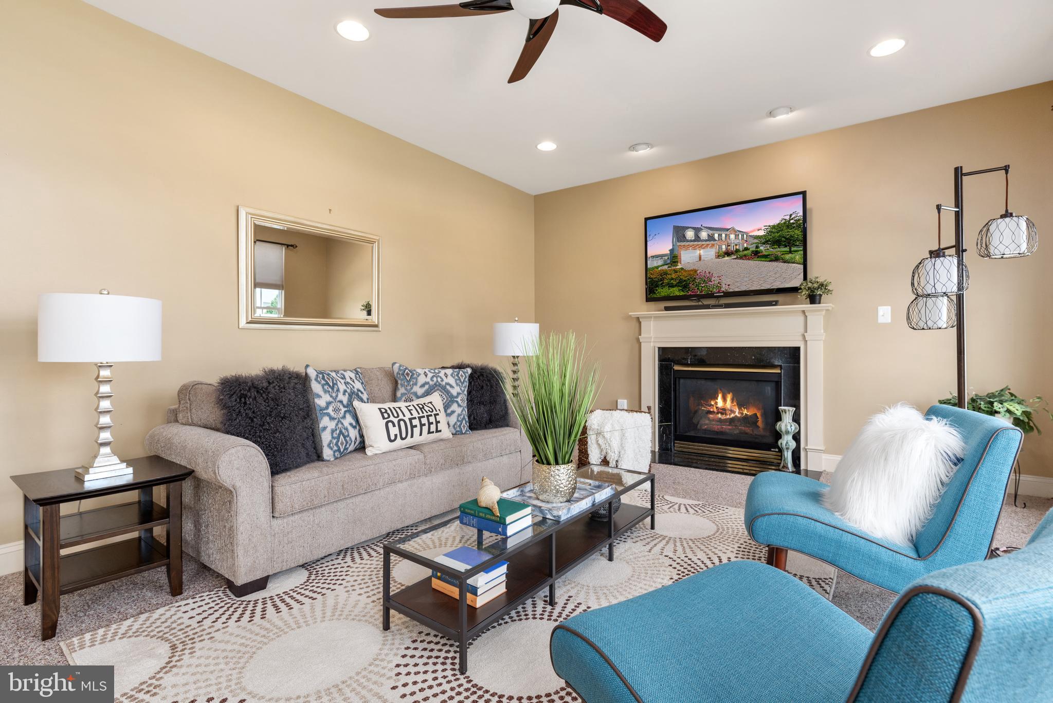 610 Sand Road Severn, MD 21144 - Photo 16 of 43 Gas fireplace in modern family room