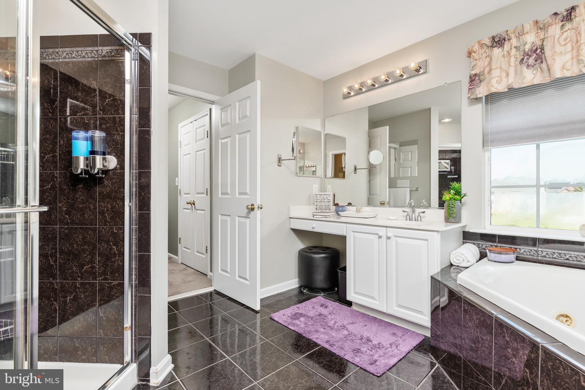 610 Sand Road Severn, MD 21144 - Photo 23 of 43 Walk-in shower and his and her vanities