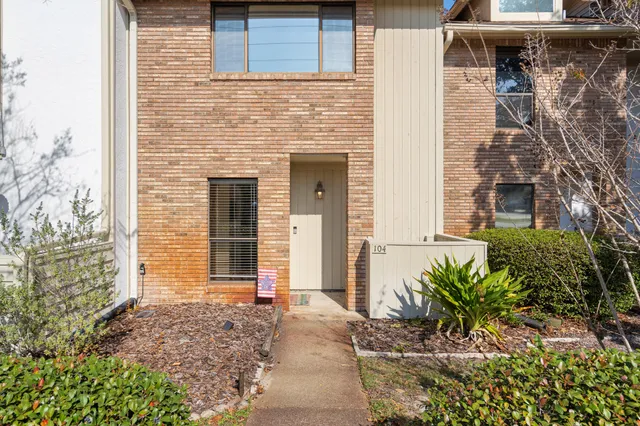 a view of a door and a window