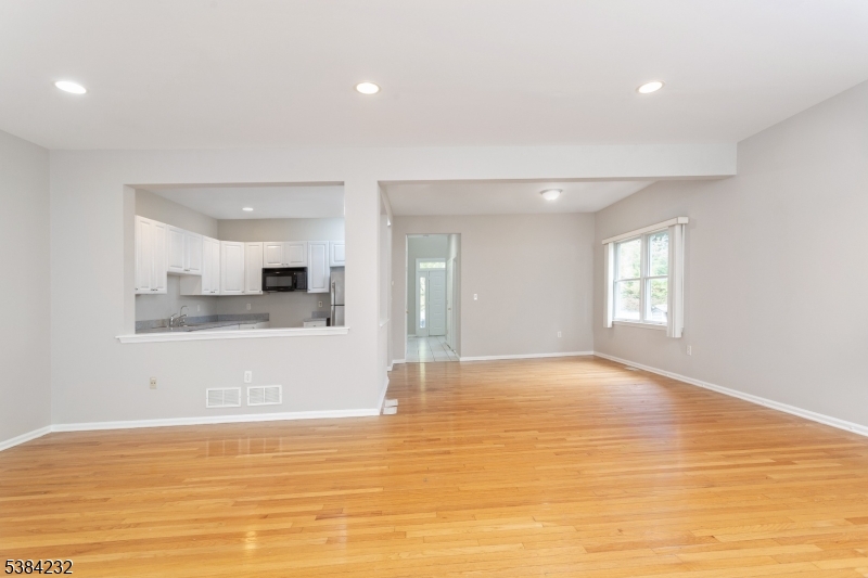 637 Old Dover Road Morris Plains, NJ 07950 - Photo 12 of 28 a view of an empty room with kitchen and window