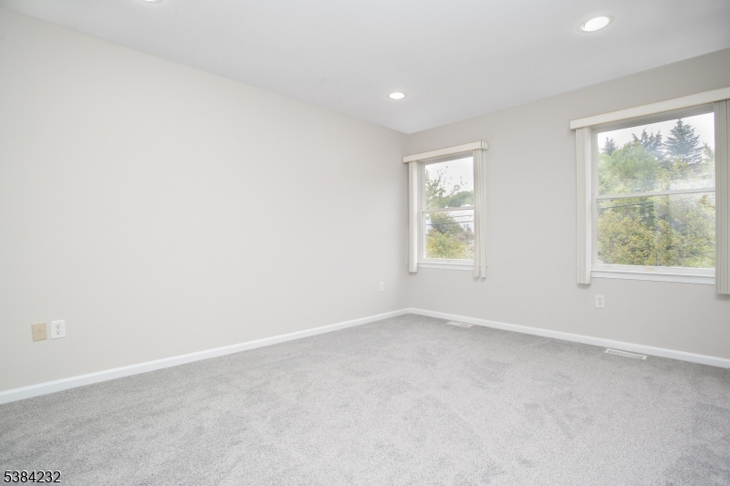 637 Old Dover Road Morris Plains, NJ 07950 - Photo 14 of 28 an empty room with windows