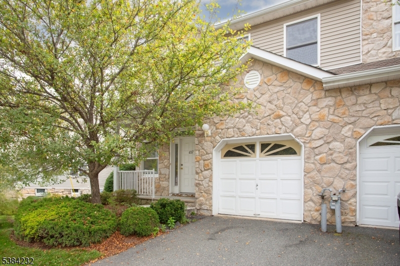 637 Old Dover Road Morris Plains, NJ 07950 - Photo 26 of 28 a front view of a house with a garage