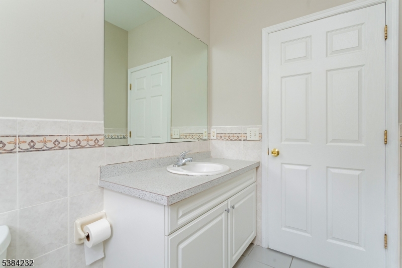 637 Old Dover Road Morris Plains, NJ 07950 - Photo 6 of 28 a bathroom with a sink and a toilet