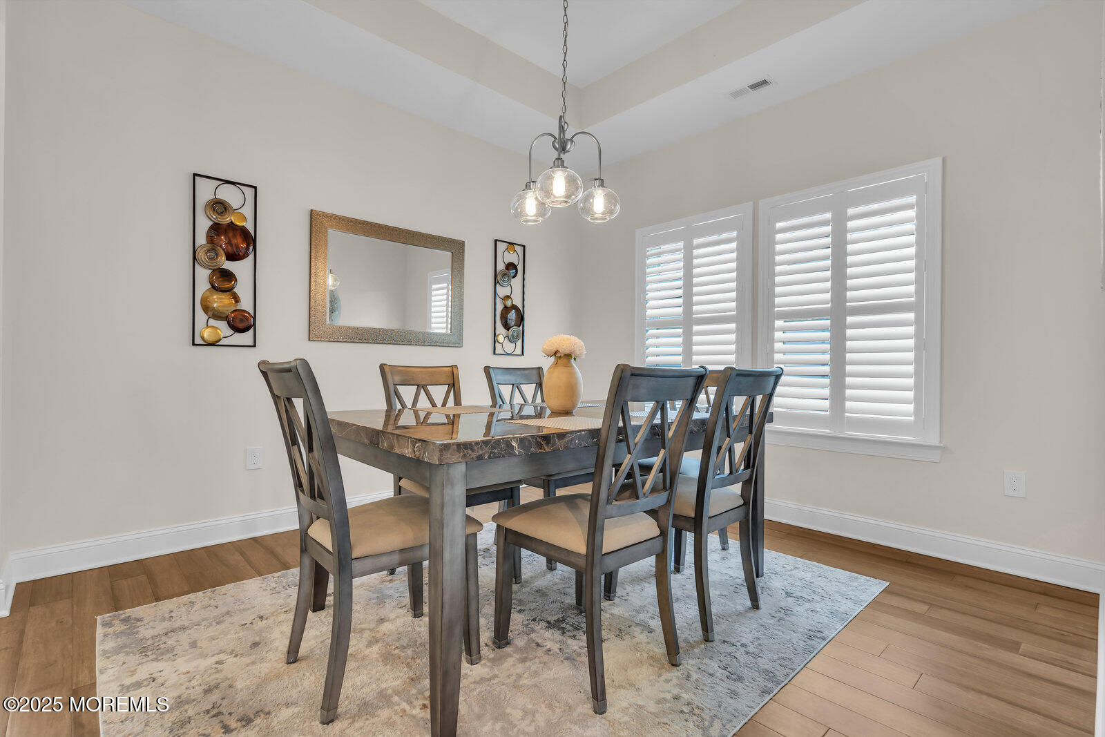 65 Moonlight Drive Barnegat, NJ 08005 - Photo 12 of 68 a view of a dining room with furniture window and wooden floor