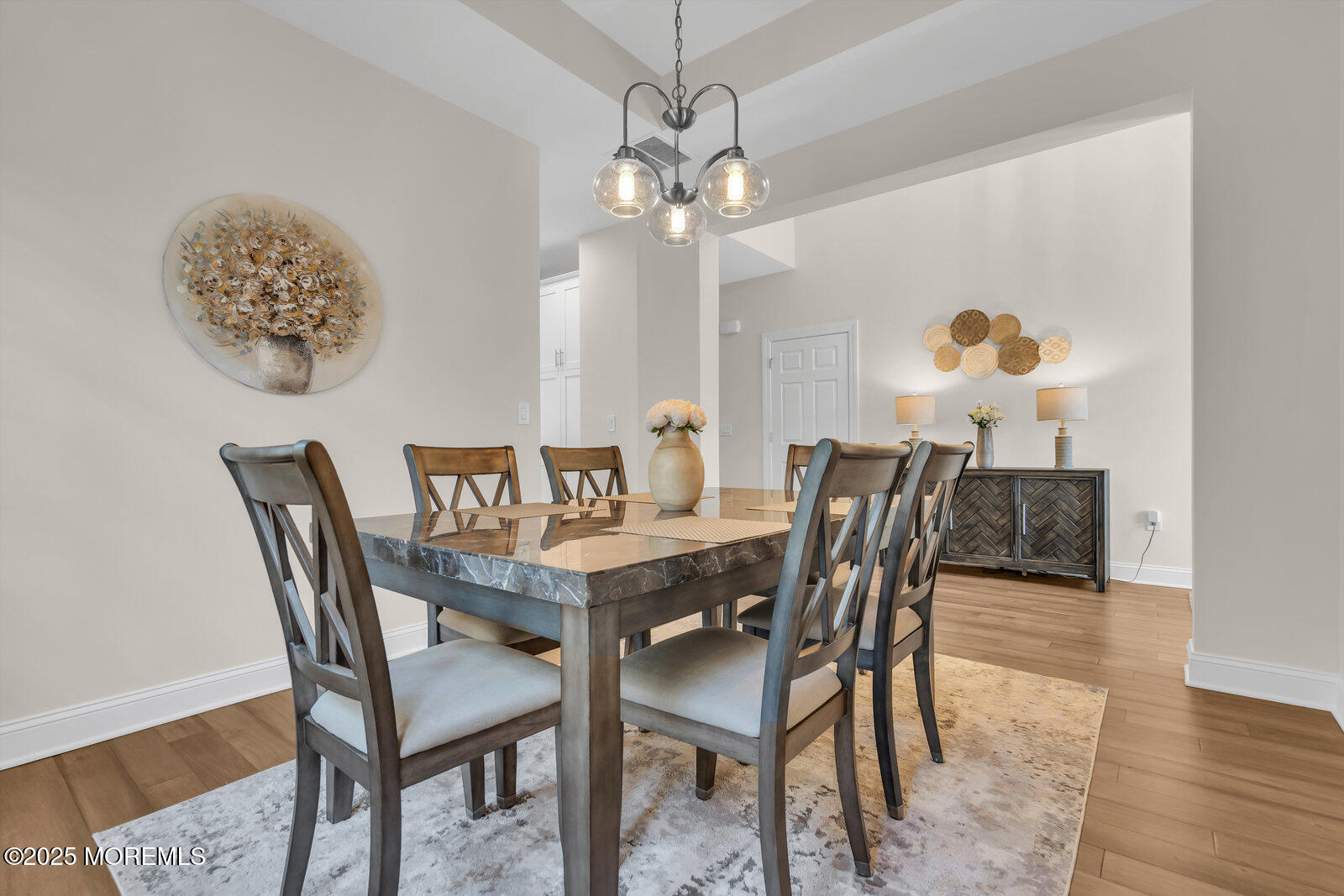 65 Moonlight Drive Barnegat, NJ 08005 - Photo 13 of 68 a dining room with furniture and wooden floor