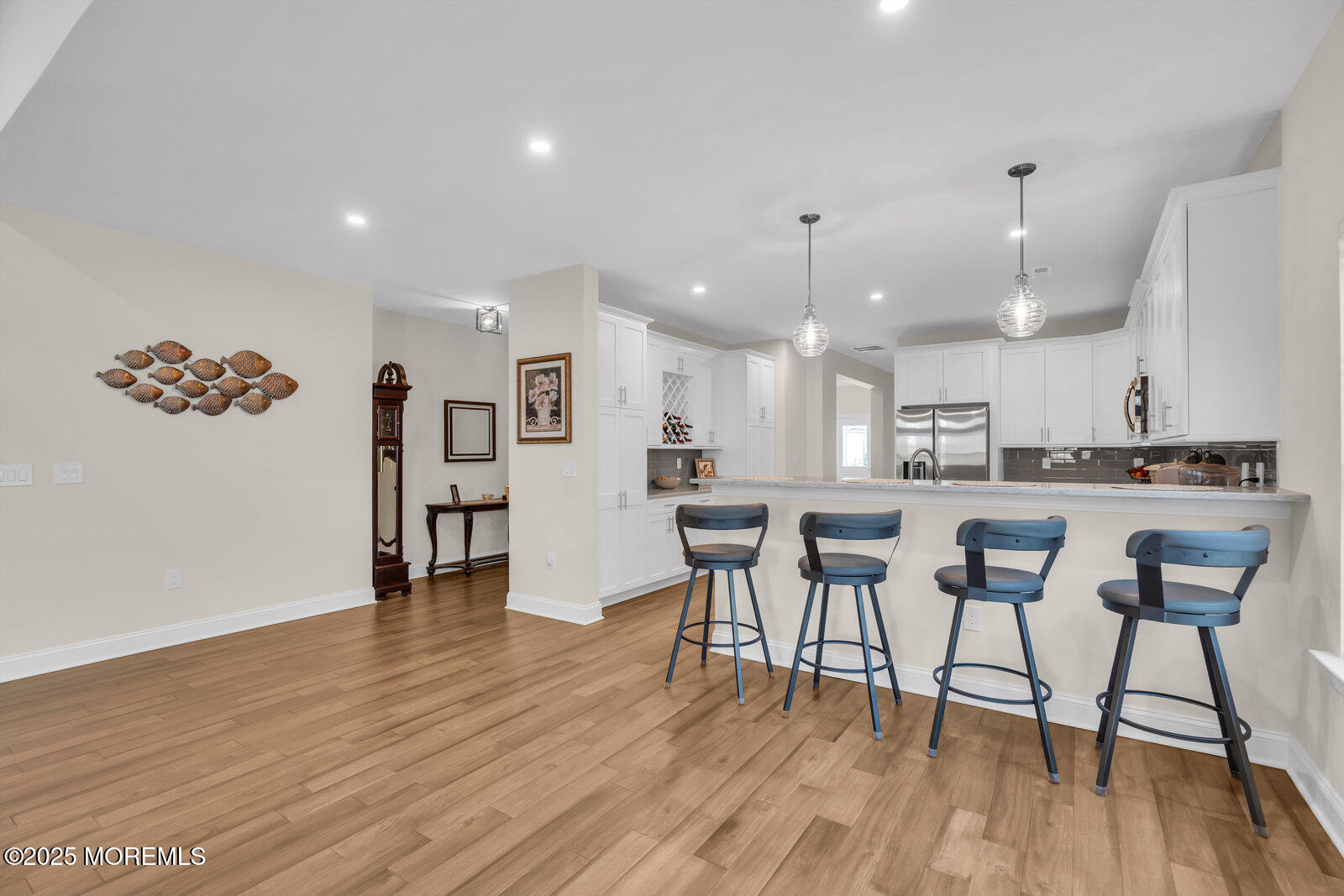 65 Moonlight Drive Barnegat, NJ 08005 - Photo 20 of 68 a view of kitchen with cabinets and wooden floor